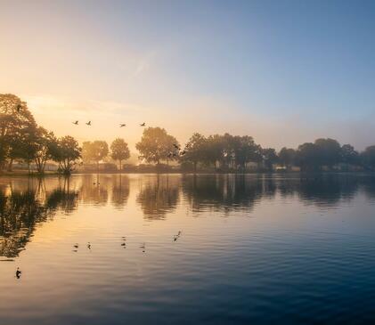 Misty Autumn sunrise over Pearl Lake