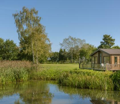 Lake edge luxury lodges at Pearl Lake photo