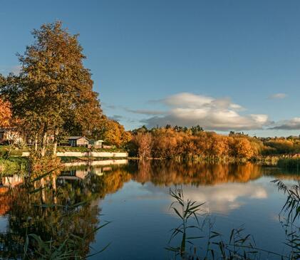 Autumn sunrise at Park Pool, Pearl Lake Country Holiday Park