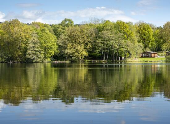 Lodge reflections across Pearl Lake