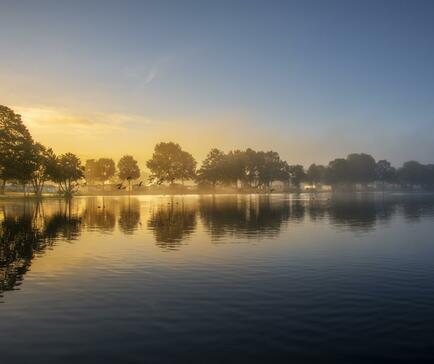 Misty Autumn sunrise over Pearl Lake