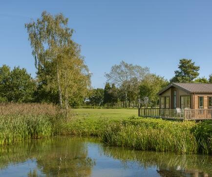 Lake edge luxury lodges at Pearl Lake photo