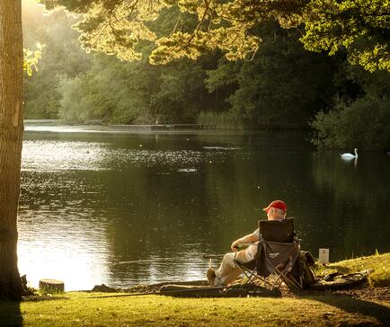 Sunset fishing at tranquil Pearl Lake holiday park