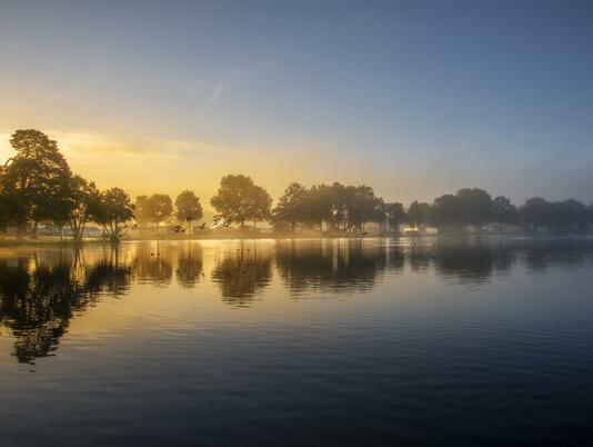 Misty Autumn sunrise over Pearl Lake