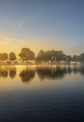 Misty Autumn sunrise over Pearl Lake