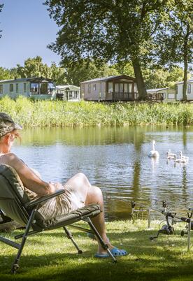 Caravan holiday park with fishing and swans 5 star