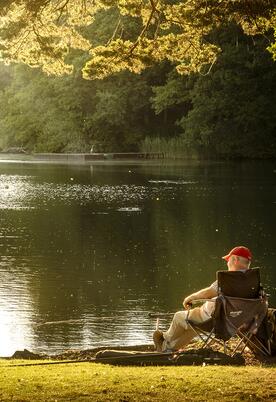 Sunset fishing at tranquil Pearl Lake holiday park