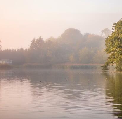 Misty Autumn sunrise over Pearl Lake