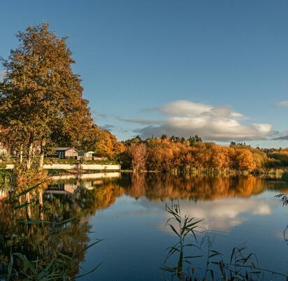 Autumn sunrise at Park Pool, Pearl Lake Country Holiday Park