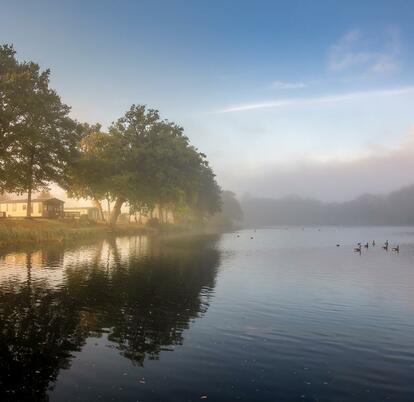 Misty Autumn sunrise over Pearl Lake