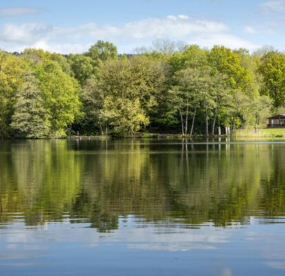 Lodge reflections across Pearl Lake