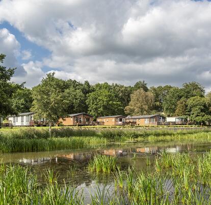 Lake edge luxury holiday lodges overlooking Park Pool at Pearl Lake, Herefordshire