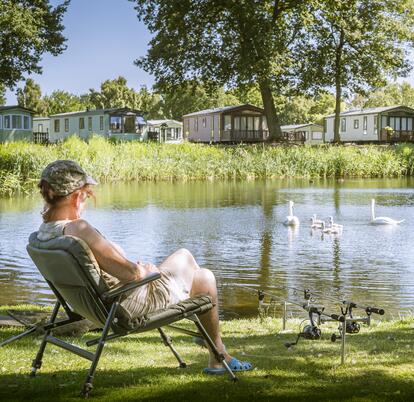 Caravan holiday park with fishing and swans 5 star