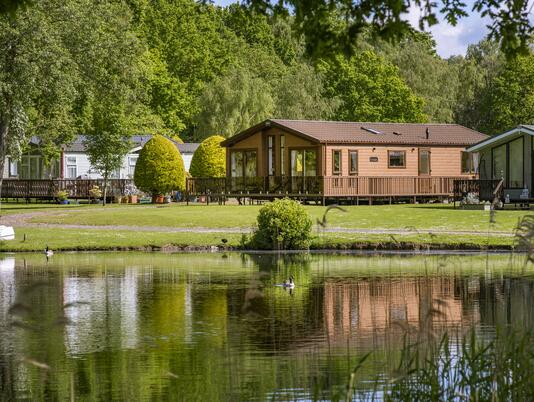 Lake edge luxury lodges at Pearl Lake photo