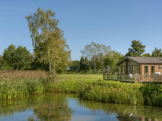 Lake edge luxury lodges at Pearl Lake photo