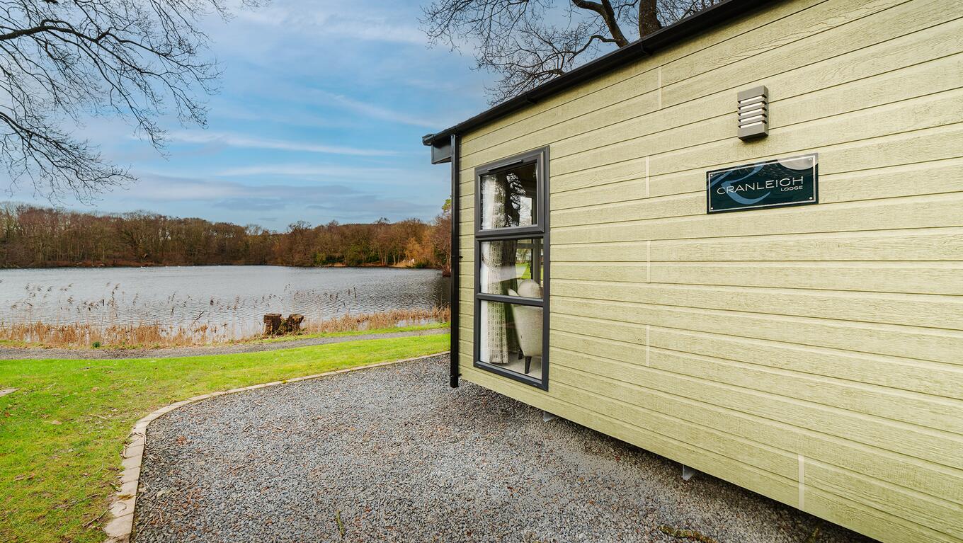 Regal Cranleigh Lodge holiday home for sale at Pearl Lake Country Holiday Park. Lake edge plot photo