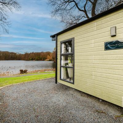 Regal Cranleigh Lodge holiday home for sale at Pearl Lake Country Holiday Park. Lake edge plot photo