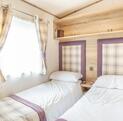 ABI Elgar holiday home for sale at Discover Parks guest bedroom photo