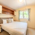 Regal Elegance holiday home for sale on 5 star caravan park with bar restaurant. Main bedroom photo