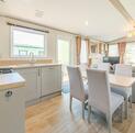 ABI Windermere holiday home for sale at Discover Parks kitchen dining photo