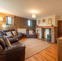 Pet friendly holiday cottage with fishing and golf course - lounge photo