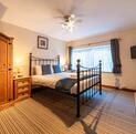 Pet friendly holiday cottage with fishing and golf course - main bedroom photo