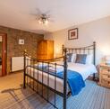 Pet friendly holiday cottage with fishing and golf course - main bedroom photo