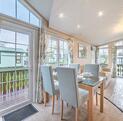 Pemberton Serena holiday home sale on 5 star holiday park - dining area photo