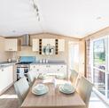 Regal Harlington caravan holiday home for sale on 5 star static caravan holiday park. Kitchen dining area photo