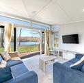 Willerby Vogue Nouveau for sale on lake edge pitch at 5 star caravan holiday park. Lounge photo