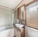 ABI Beaumont for sale on Lake view plot at Pearl Lake Country Holiday Park. Main bedroom en-suite bathroom photo